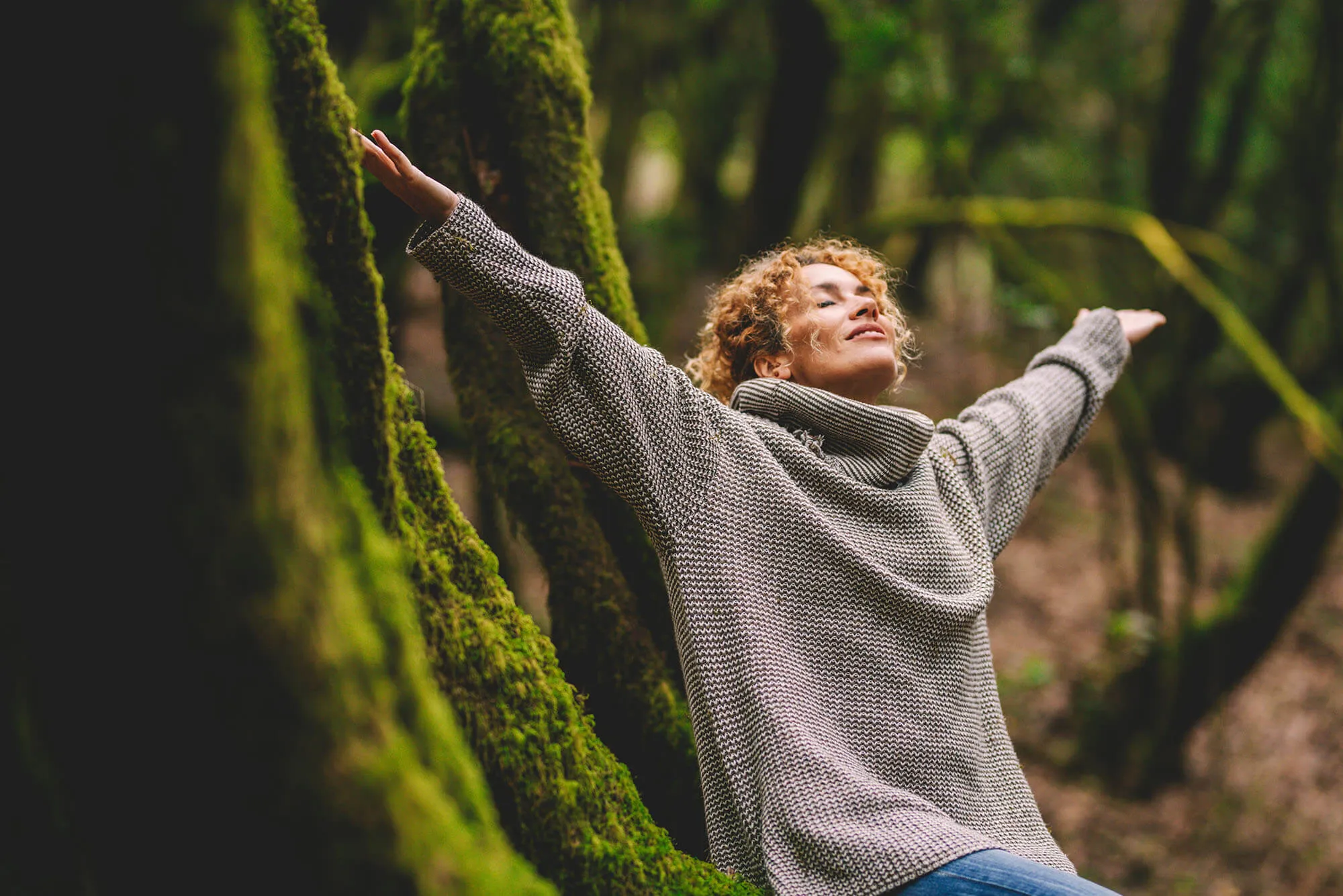 Happy woman enjoying the nature